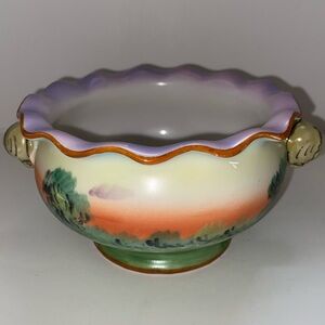 Noritake hand painted small trinket dish with cute handles.